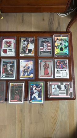 Baseball, football and basketball cards