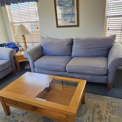 Living room couch, love seat with coffee table and end tables