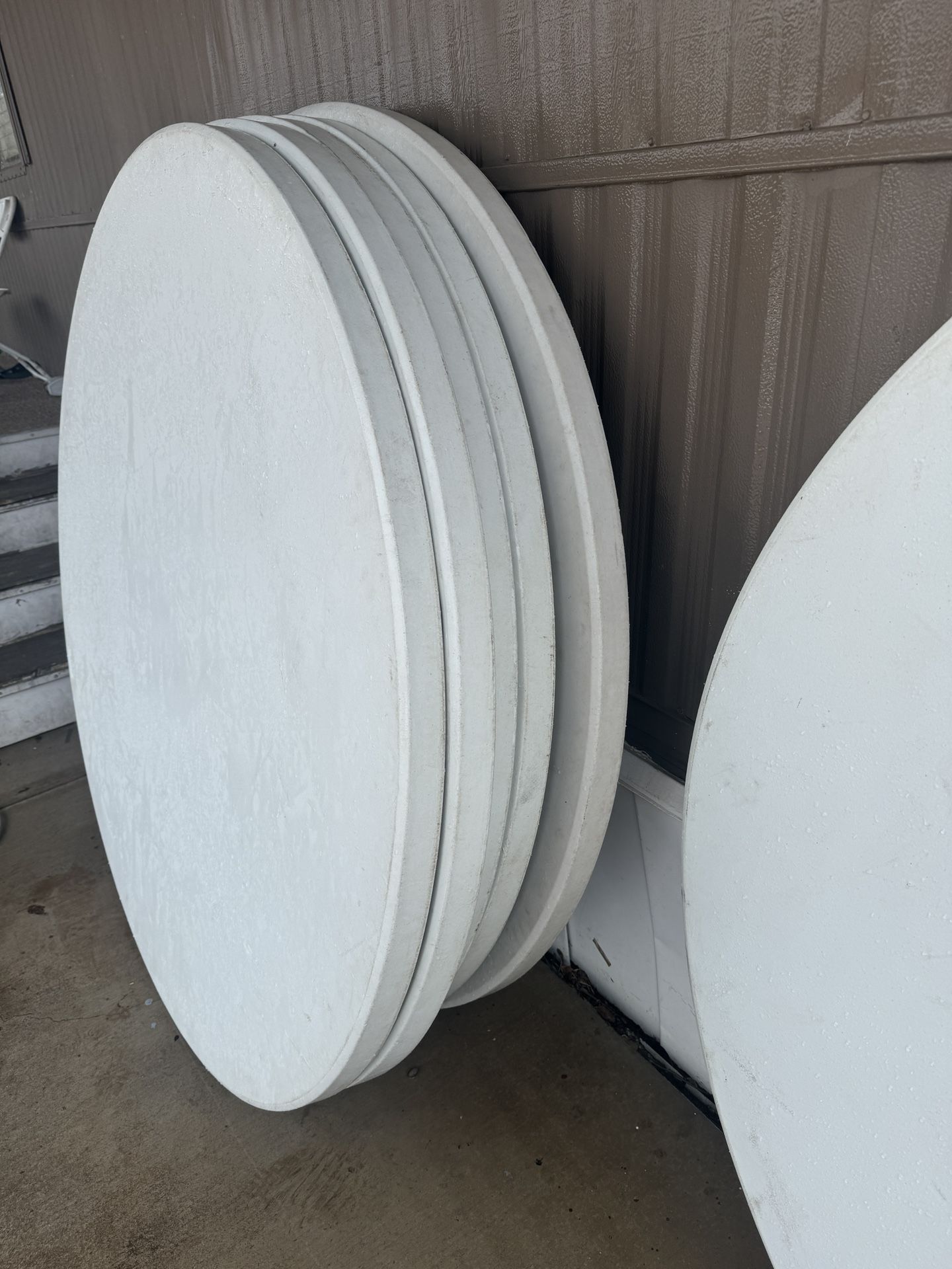 60 Inch Round Plastic Tables $85 Each