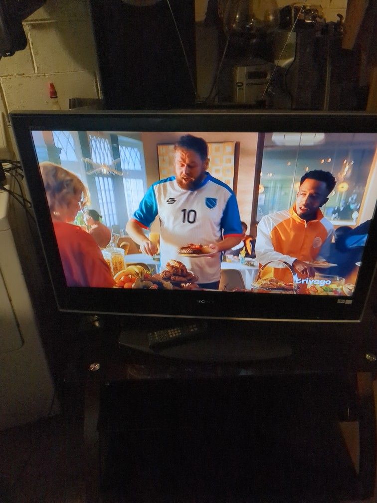 42 Inch Older Model Sony TV That Swivel Come With TV Stand And Remote Control It's All Good.