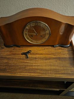 Art Deco Mantel Clock in Wood with Chiming Mechanical Movement, circa 1930
