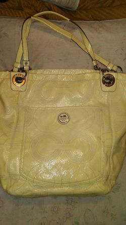 Ivory patent leather coach purse with shoulder strap