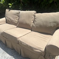 Free sofa Slipcover sleeper and Love Seat must Pick Up Today 