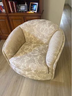 2 Swivel Barrel Chairs