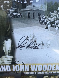 Framed autographed John Wooden court dedication poster