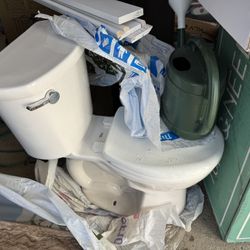 White Toilet Comfort Height Round