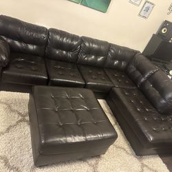 Brown "faux" leather couch + ottoman 