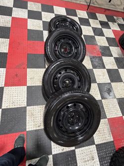 5x 100 steelies with tires 225/60/R17