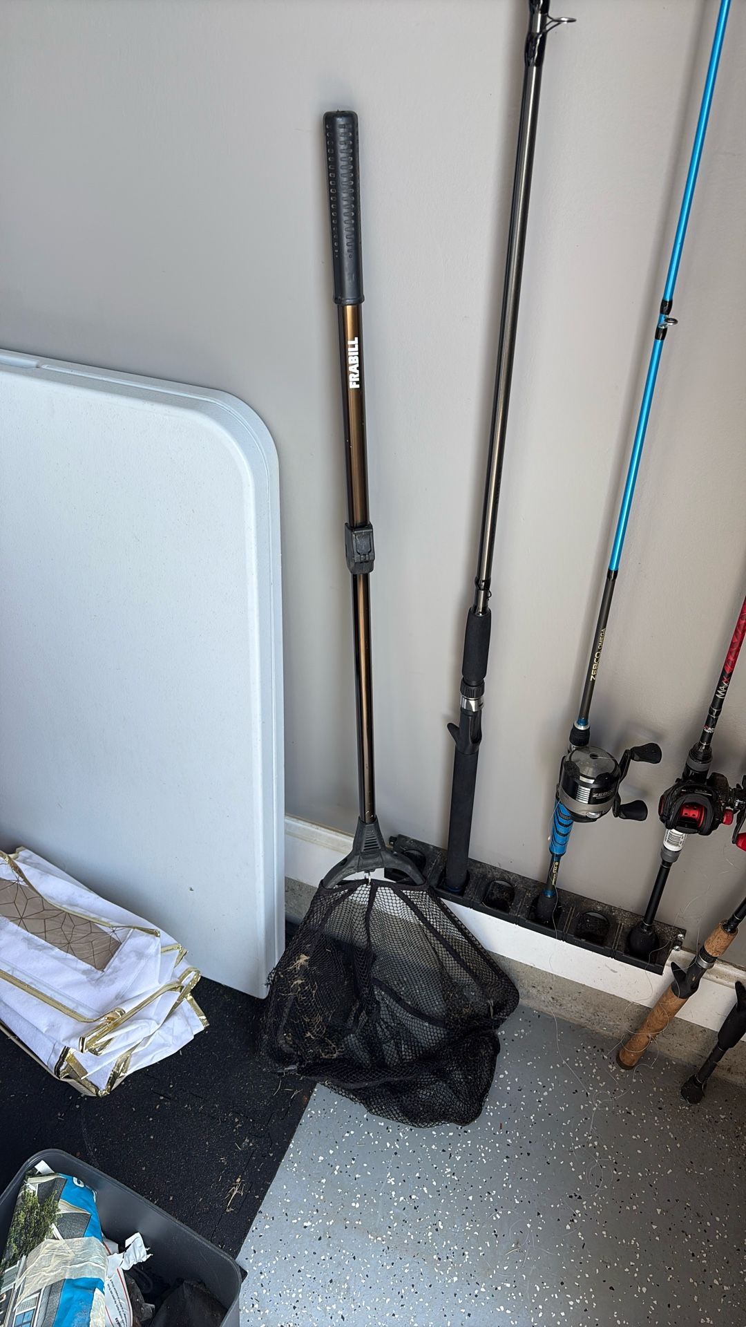 Fishing Rods And Fish Net
