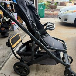 Uppababy Cruz Stroller (2023) + Ride-Along Board + Snack Tray