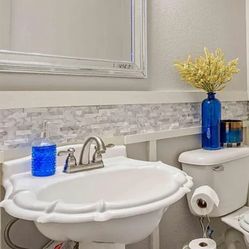 Clamshell sink and faucet