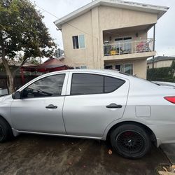 2015 Nissan Versa•SV Sedan 4D 