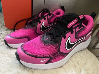 Pink Nike Running shoes