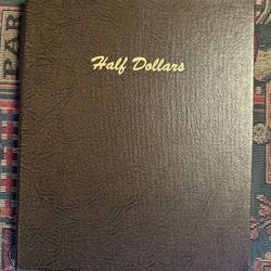 World Coin Library Album by Dansco. This listing is for a previously used #7157 Half Dollars album.