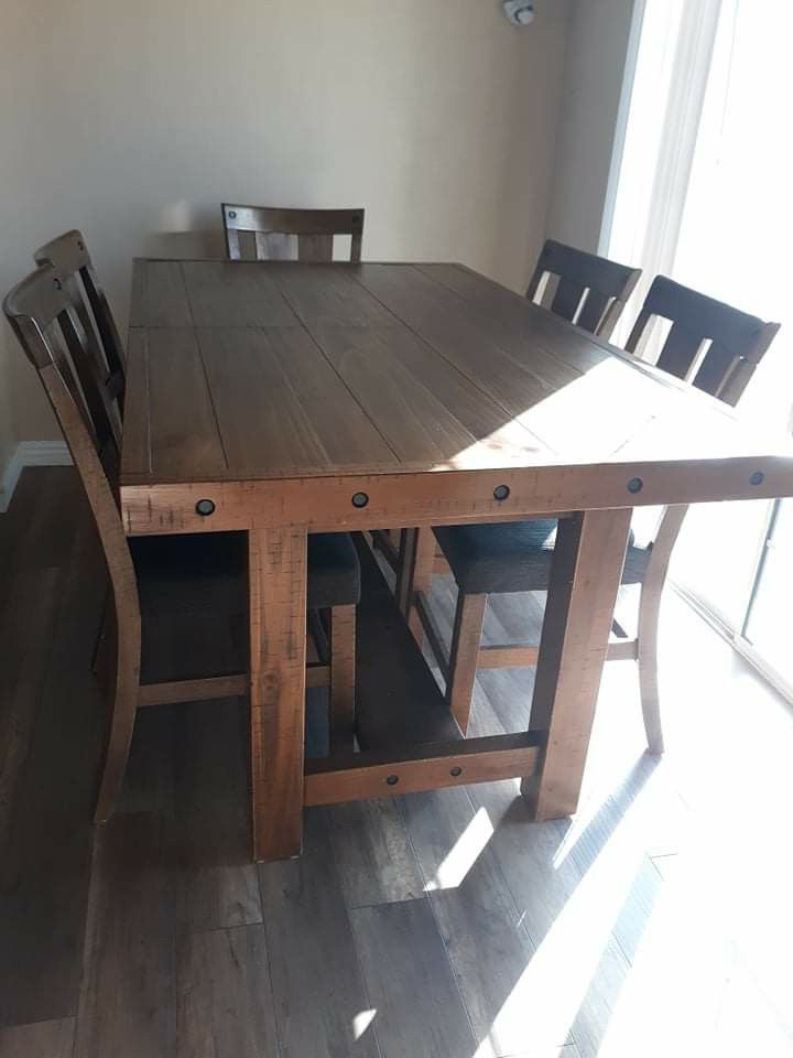 Beautiful wooden Rustic - Counter Height dining table with 6 chairs and buffet table from. Ashley