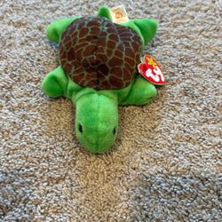 Ty Beanie Babies “Speedy” The Turtle Plush Toy Featuring A Green Body And Brown She’ll
