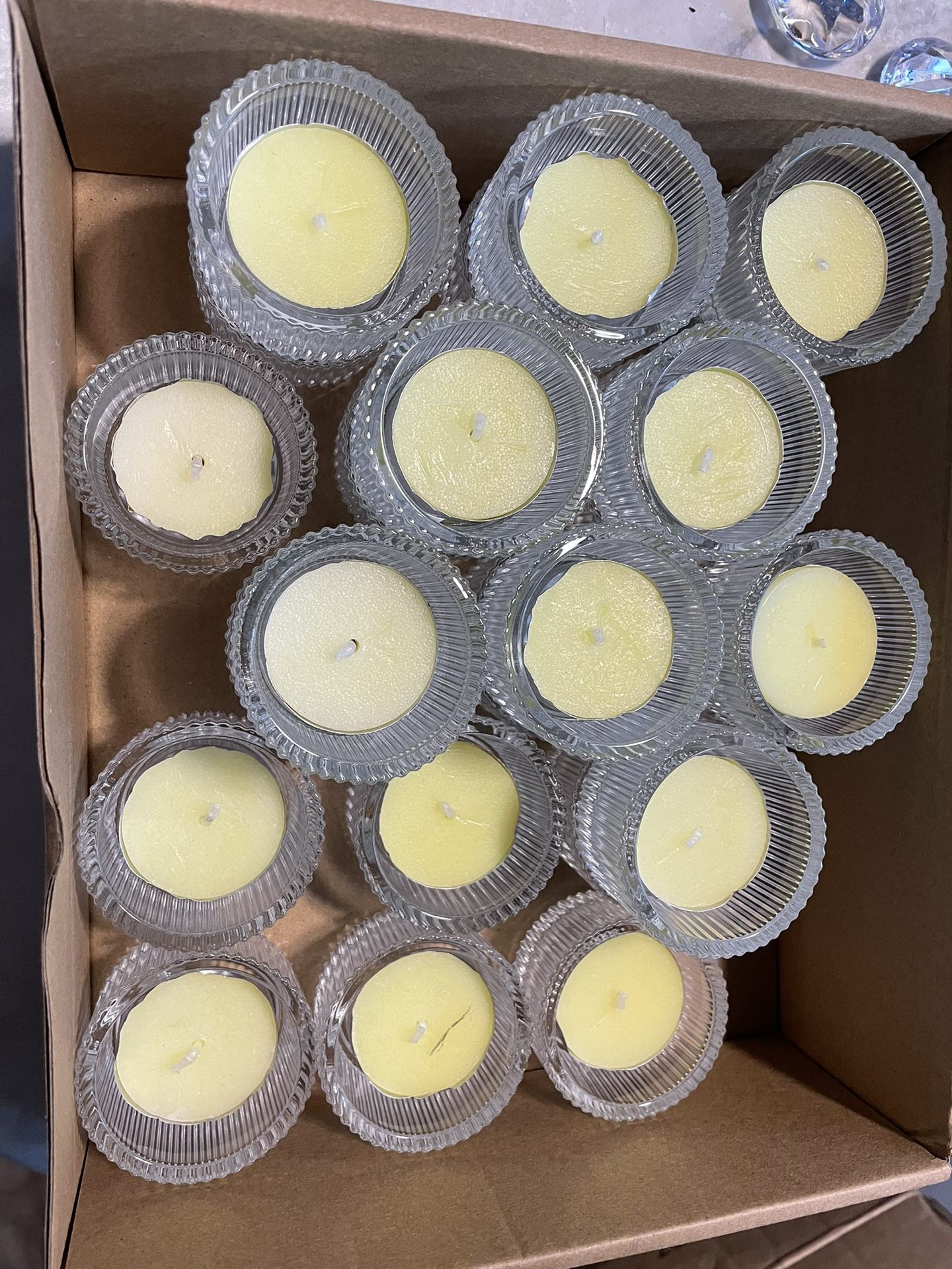 24 glass tea light holders With Candles