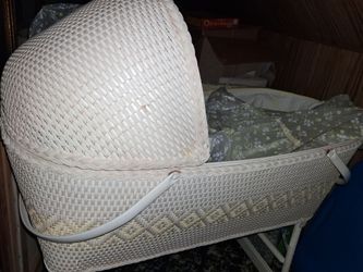 Vintage wicker baby bassinet.