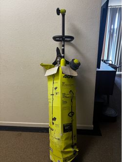 15” Ryobi Trimmer w/ battery