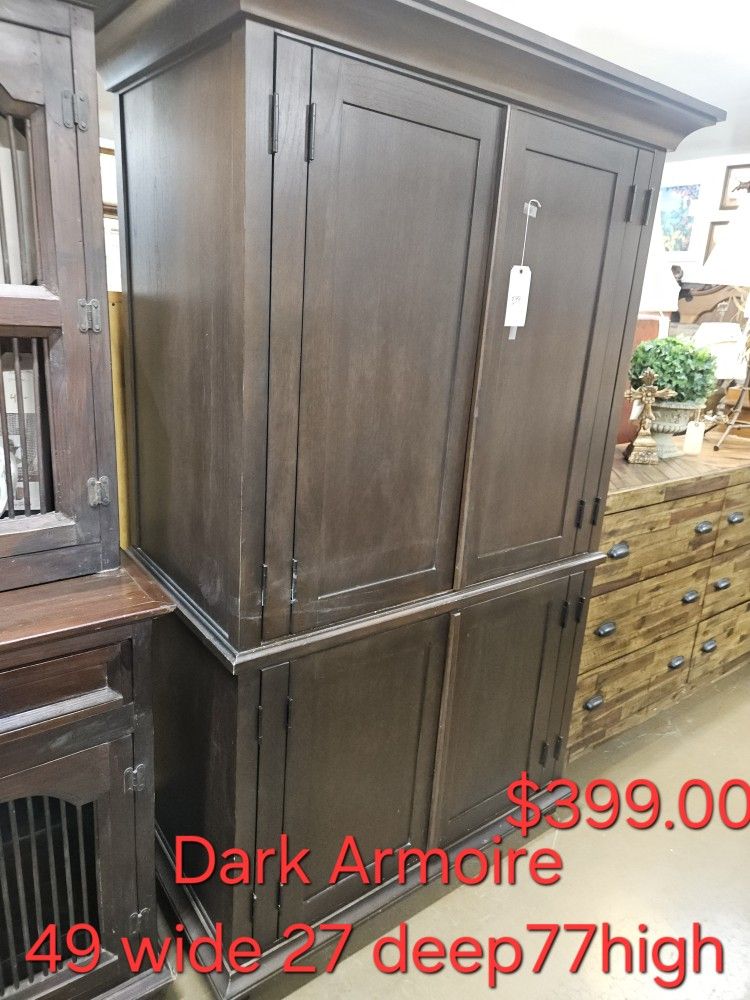Cabinet Armoire Dark Wood We are located at 2811 East Bell road. Another Time Around Furniture.