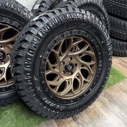 TOTAL OF 5  20x9 bronze fuel wheels wrapped in atturo xt 33x12.50R20 tires
