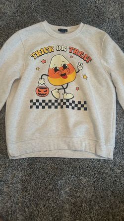 Halloween sweater.Never worn. Size adult small and very cozy