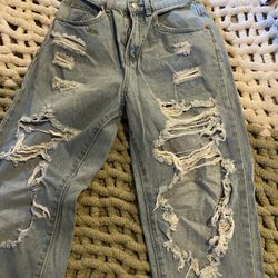 Woman’s Distress Jeans Size Small