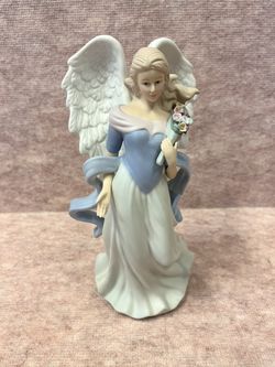 Porcelain Angel Figurine - “Charity”