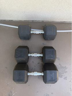 Two 50lb and one 45lb dumbbells