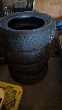 Studded tires great for winter conditions like new