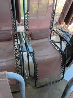 4 piece set of brown reclining lounge chairs