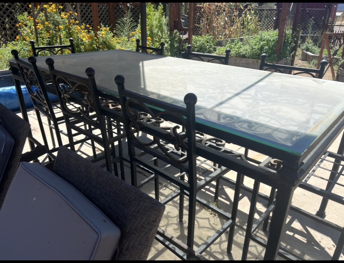 Gorgeous Solid Metal Table With Glass Top And 8 Chairs