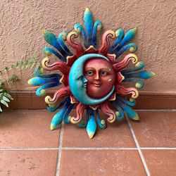 Metal Sun/Moon Decor $39 