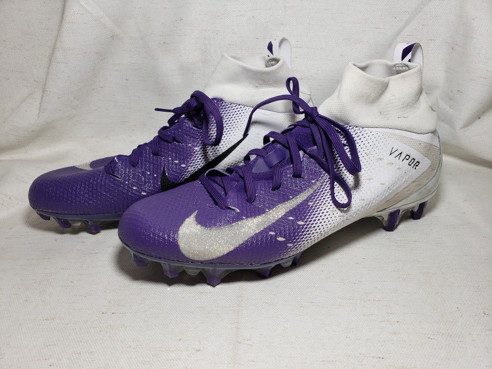 Nike Vapor ladies track shoes size 10 . Colors are purple & white.  Bottom of shoe measures 11 1/2" L . Shoes are in great condition used just a few t