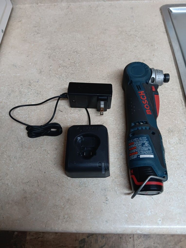 bostitch 10.8 volt cordless impact drill with battery and charger used 1 time works great