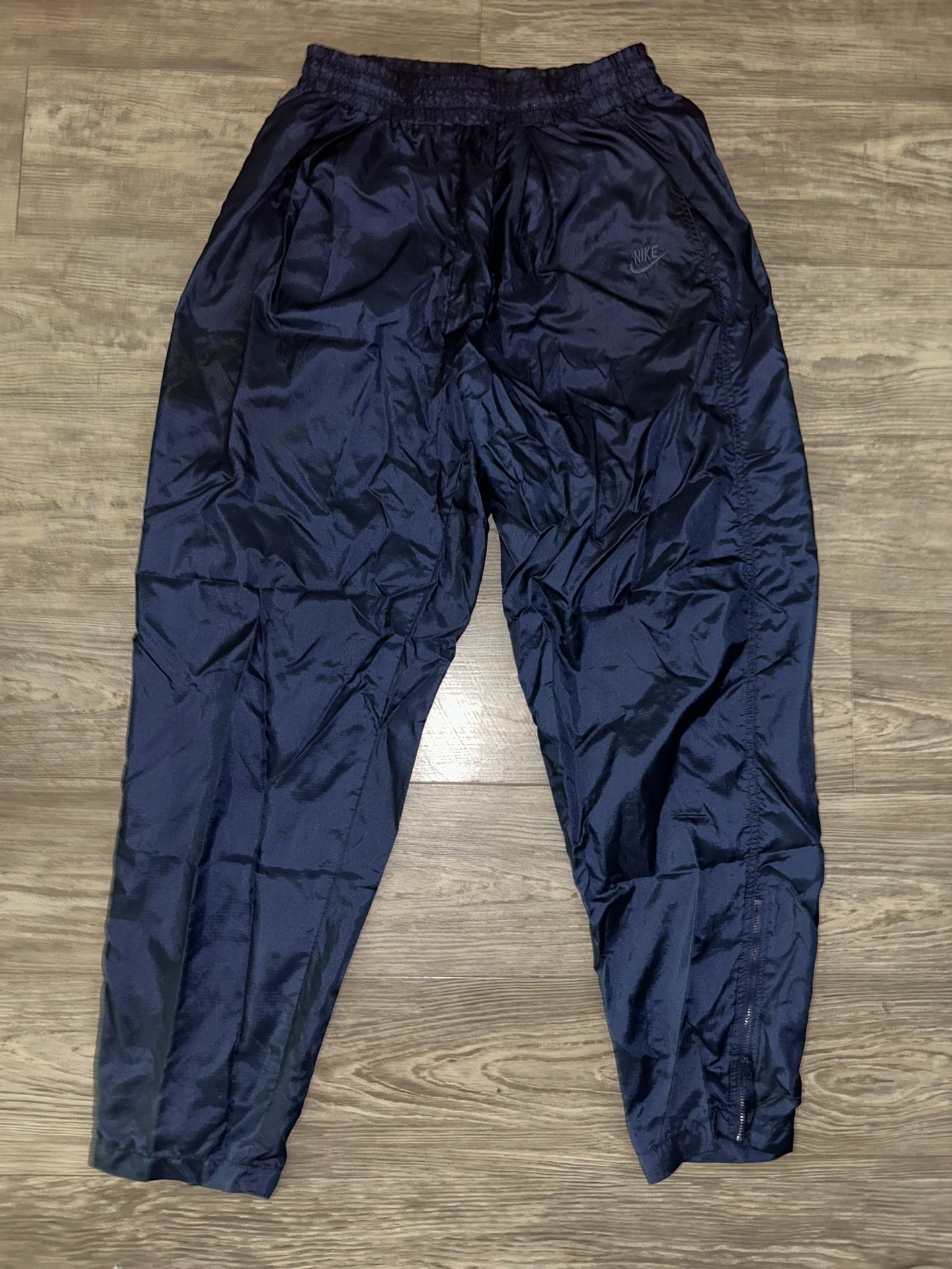 Vintage Nike Track Pants ( With zippers on the ankle ).