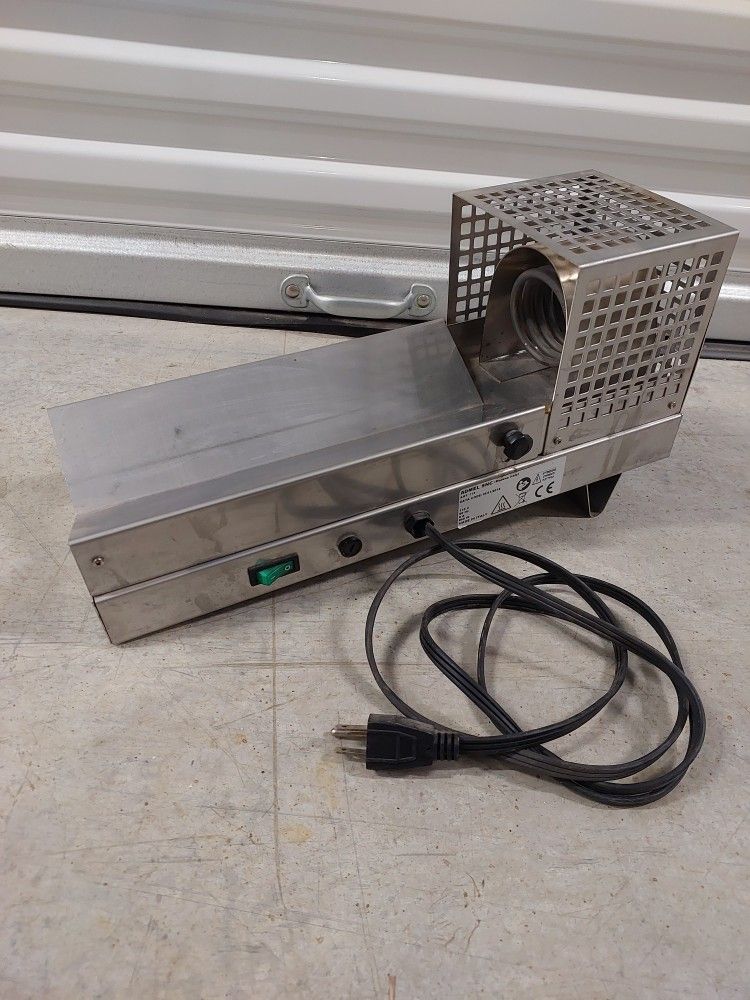 Heat Shrinker for Foil Capsules on Bottles