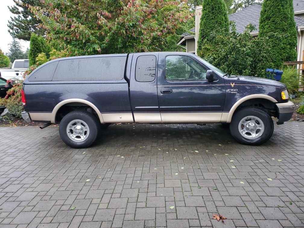 Canopy 1(contact info removed) F150 blue Snug top top gun Ford blue - $425 (Lynnwood