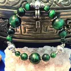 Green african tiger eye accented with silver colored fobs small