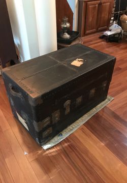 Old black travelers trunk