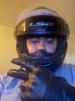 Motorcycle helmet and leather gloves