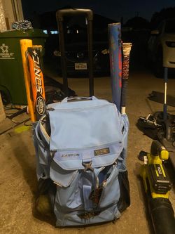 Blue Easton 5-Tool Phenom Wheeled Bag with softballs, gloves and bats