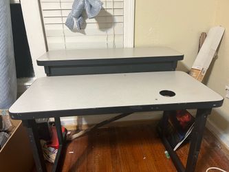 Lifted grey desk