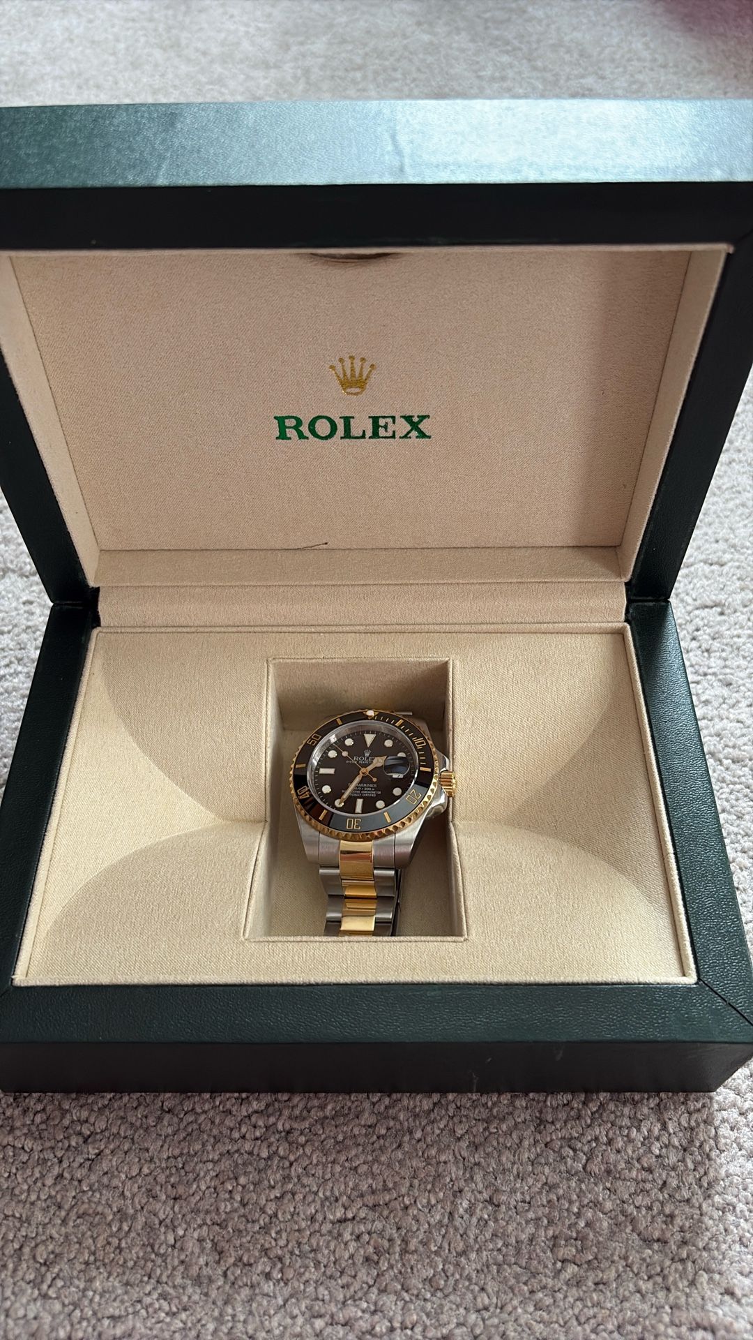 A Gold And Silver Rolex submariner