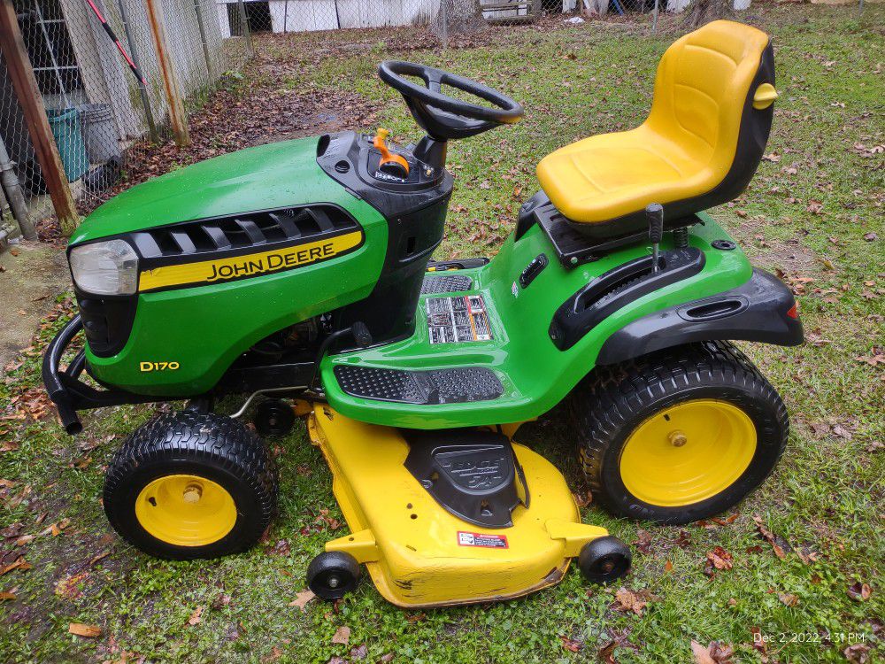 MOVING. MUST SELL QUICKLY... John Deere Lawn Tractor