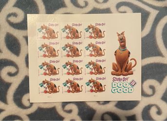 Forever stamps featuring Scooby-Doo watering a plant.