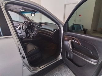 2012 Silver Acura MDX 135,000mil.