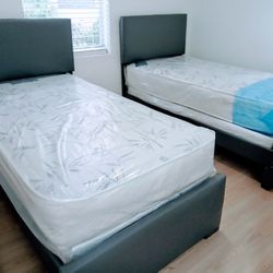 $550 For 2/Twin Beds/2 Mattress/2 Box Spring/ New In Plastic Free Delivery Free Assembly 
