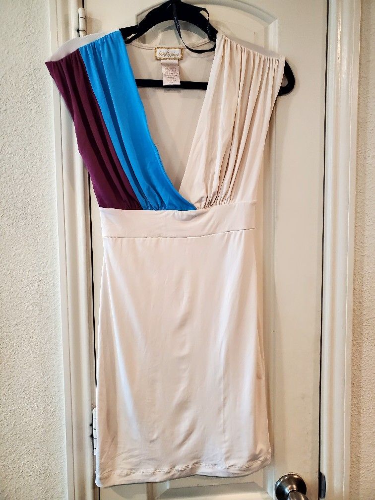 baby Phat spandex dress
purple/ cream/ light blue size S