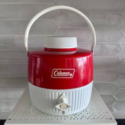 vintage 1985 1-gallon Coleman red metal & plastic insulated water jug cooler  Has lid and internal nesting